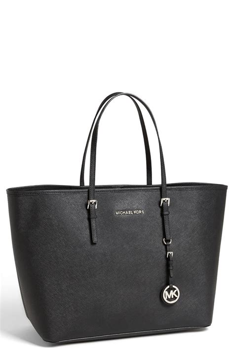 black michael kors jet set travel purse|Michael Kors designer tote jet set.